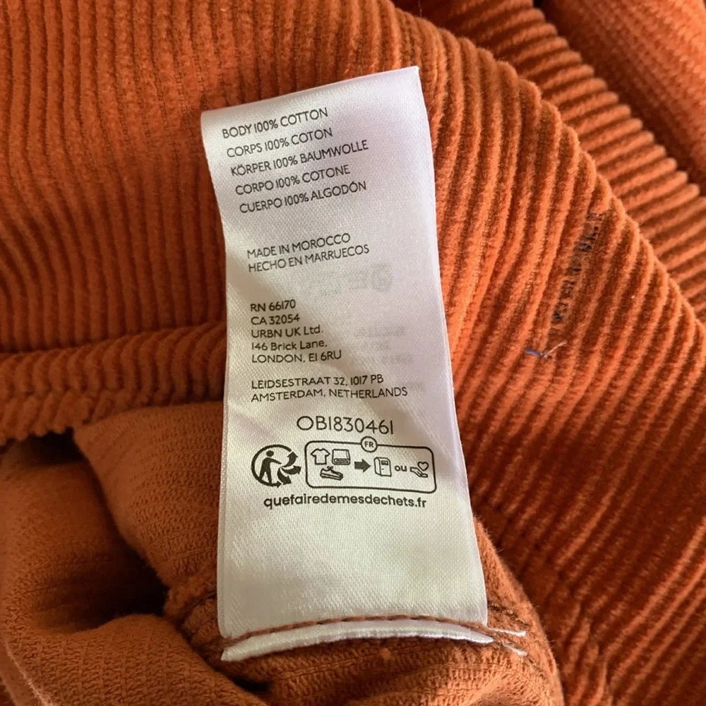 Free People High Roller Corduroy Jumpsuit in Burnt Orange